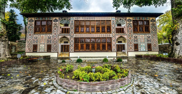 Exterior view of Sheki Khan’s Palace with colorful stained glass windows
