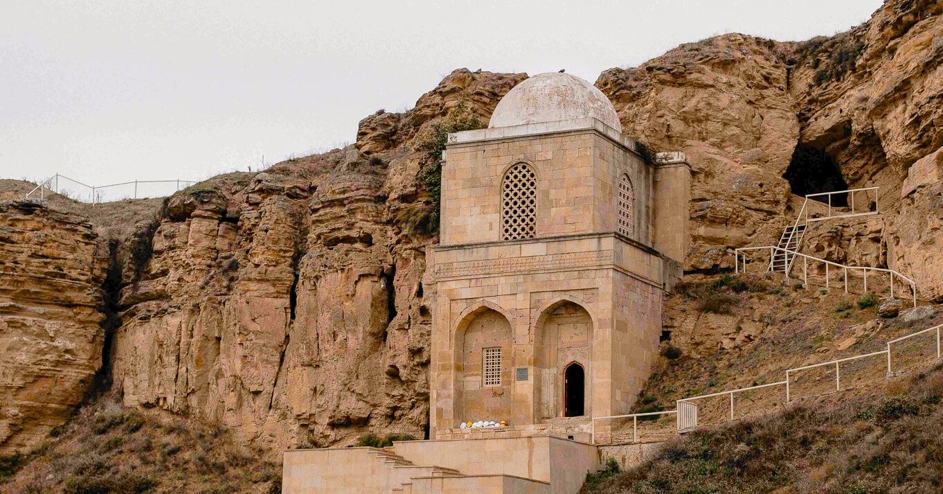 The mystical Diri Baba Mausoleum, a 15th-century Sufi dervish tomb carved into the rock face.