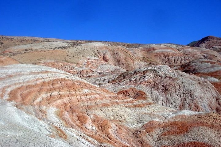 The vibrant Candy Cane Mountains with their unique striped patterns