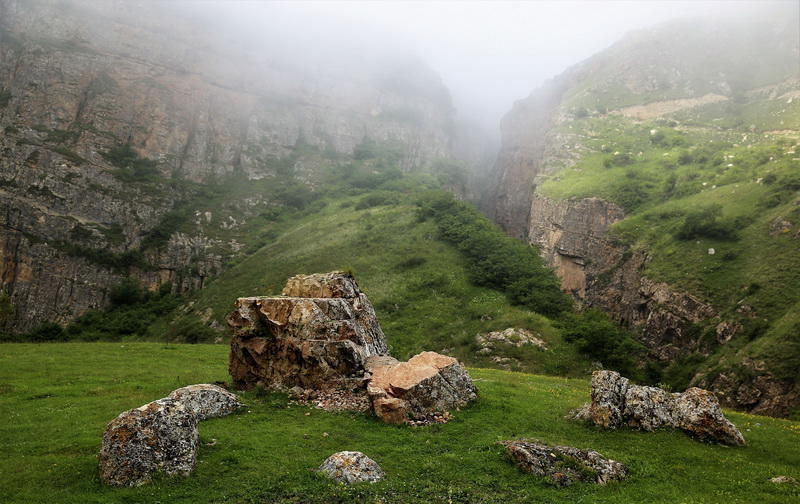 Rugged cliffs and rocks surrounding Khinalig village